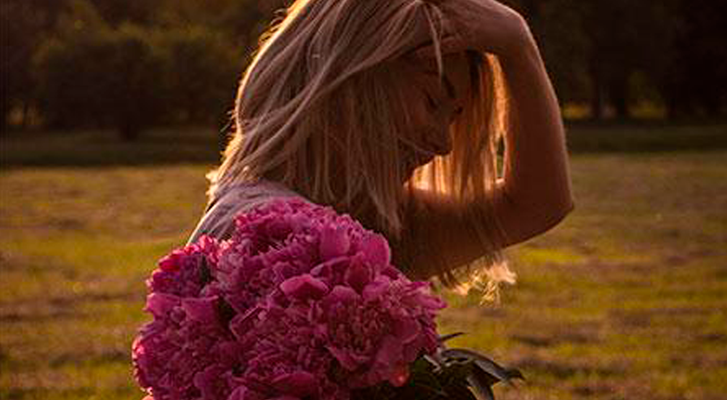 Wear flowers in your hair to be on trend for summer