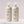 Load image into Gallery viewer, Two bottles of Neal & Wolf HYDRATE Moisture Shampoo and Conditioner, with pump dispensers, on a light background.